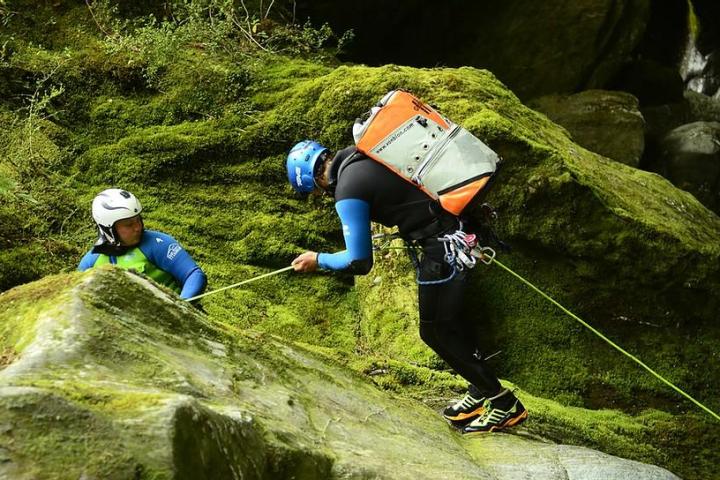 a person standing on a rock