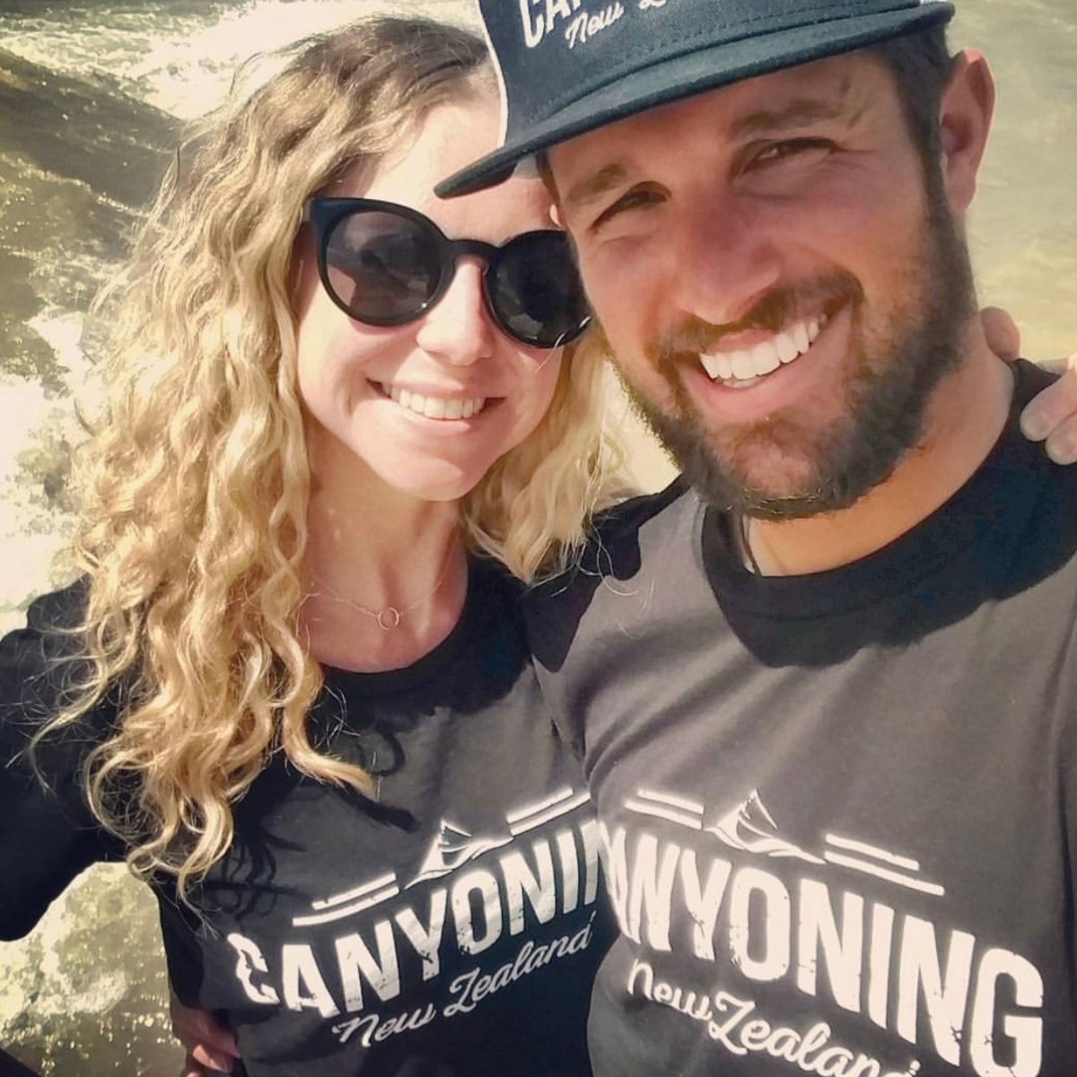 a man wearing sunglasses and a hat