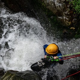 a person riding a wave on a surfboard in the water