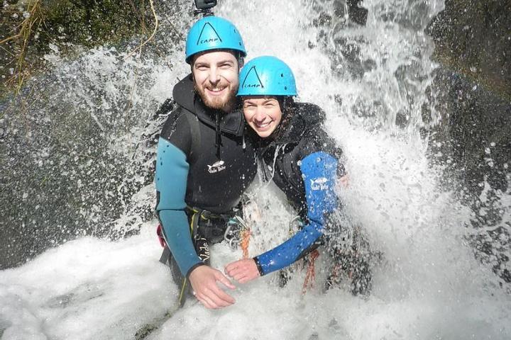 a person riding a wave on a surfboard in the water