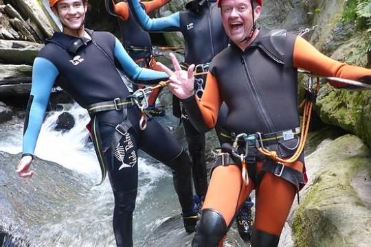 Keir Gilchrist et al. that are standing in the water