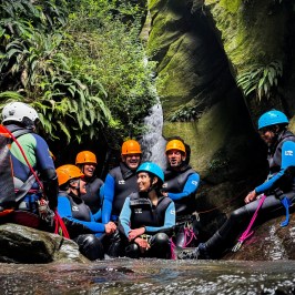 a group of people in the canyon