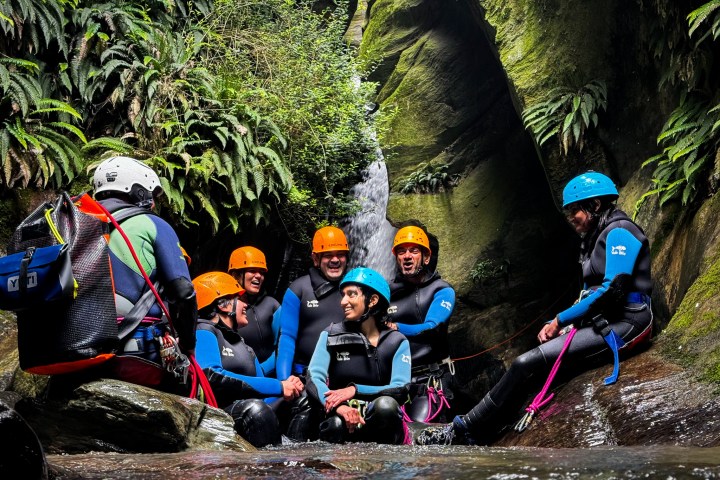 a group of people in the canyon