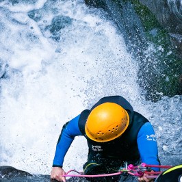 Abseiling down a waterfall