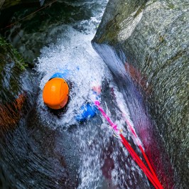 Sliding down natural waterfalls