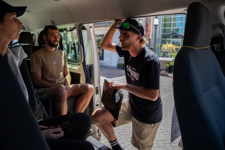 A group of people checking in for the tour