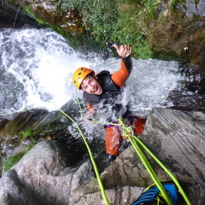 Abseiling through whitewater