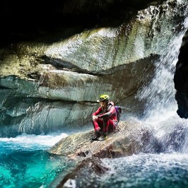 a man riding on the back of a waterfall