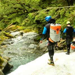 a man riding a skateboard up the side of a hill