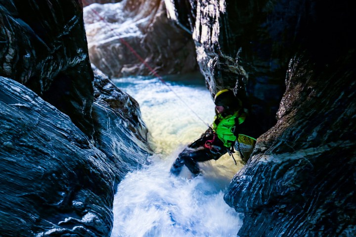 a waterfall into a body of water