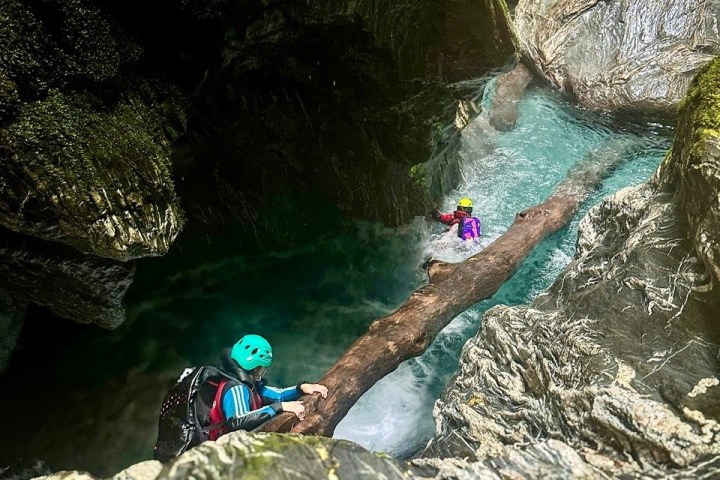 a person sitting on a rock