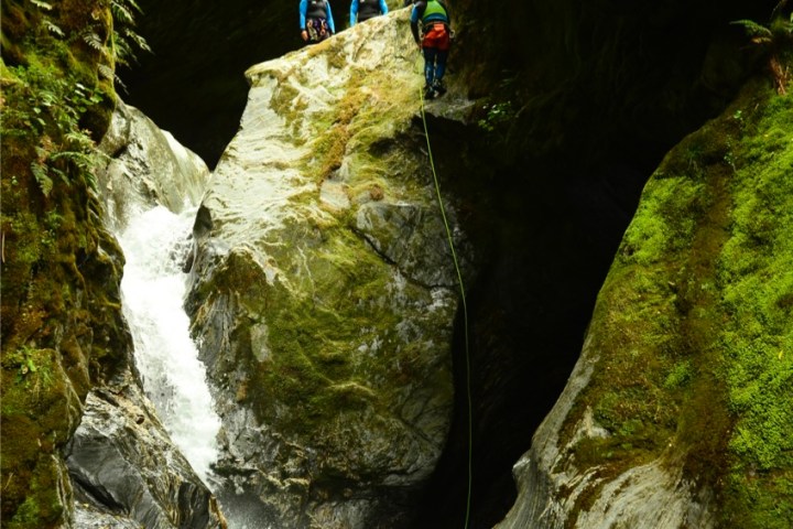 a waterfall in a forest