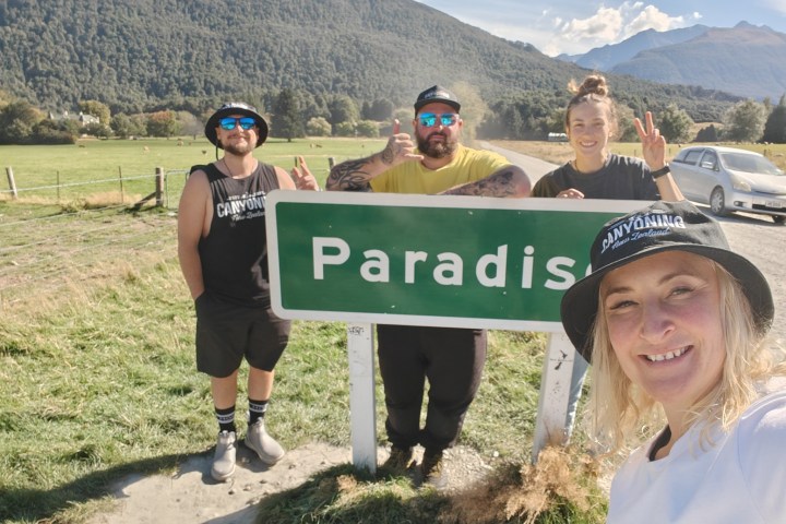 Standing by the Paradise sign in Glenorchy