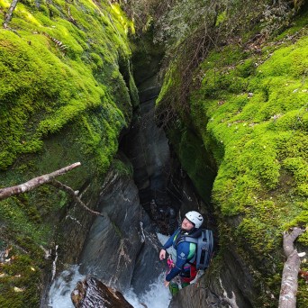 a man riding on the back of a waterfall