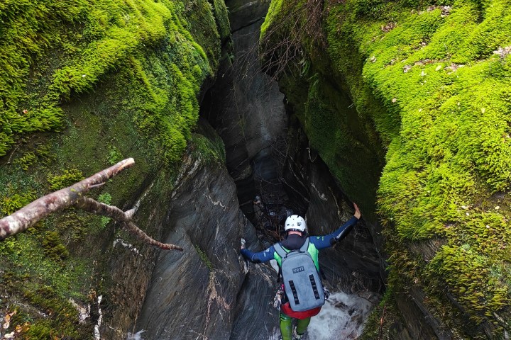 A man climbing down the canyon