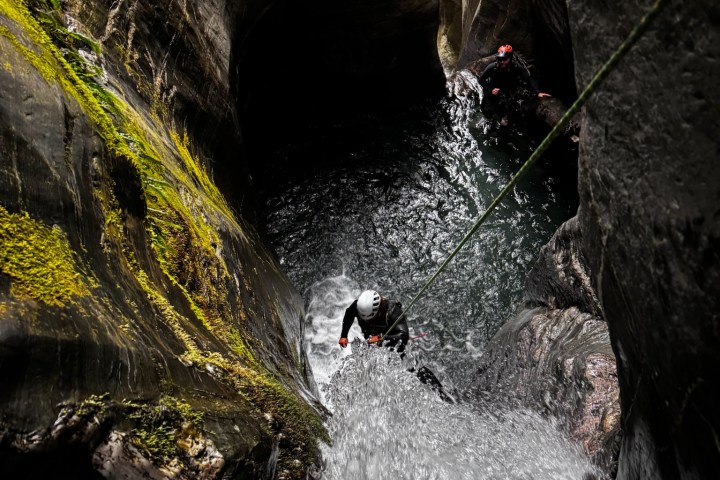 a large waterfall in a forest