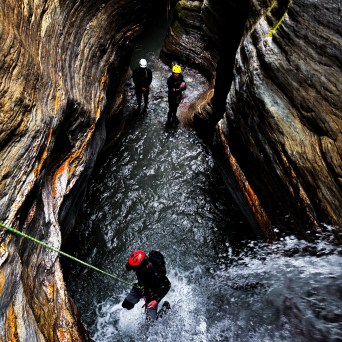 a person riding a snow board in the water