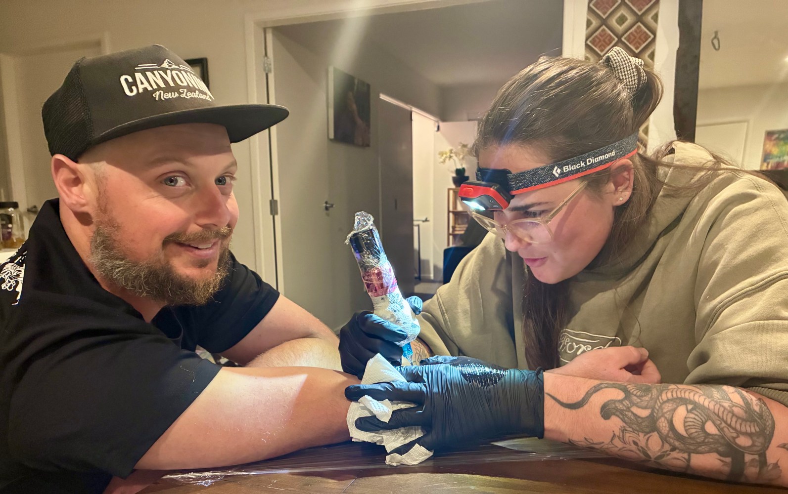 Ross getting his new tattoo 