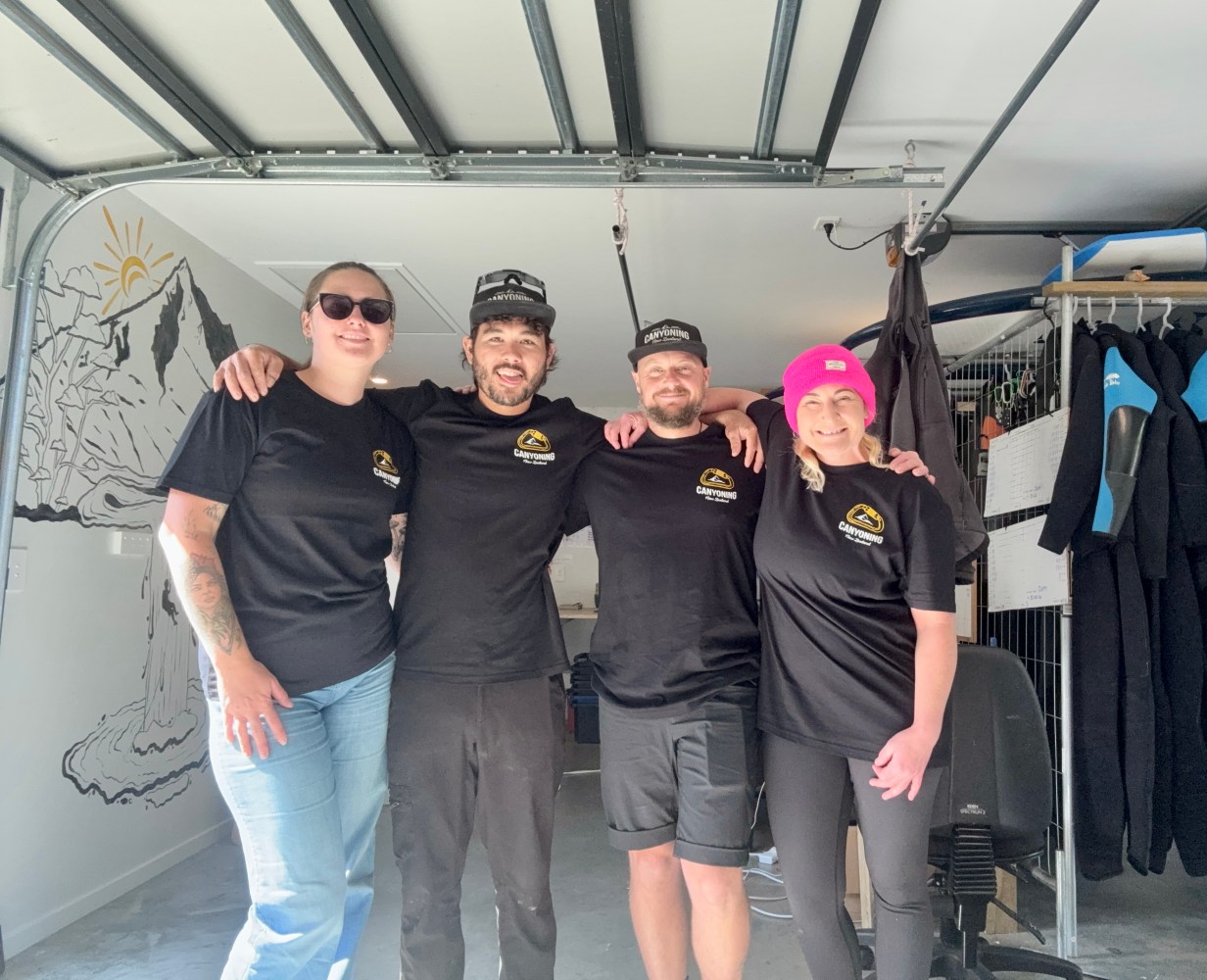 Some of the canyoning nz team wearing the new t-shirts with Kaylah's awesome design